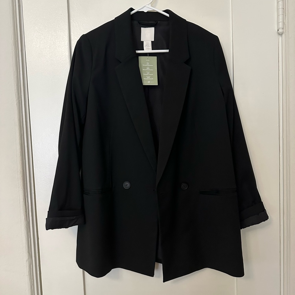 Double breasted black blazer. True to size